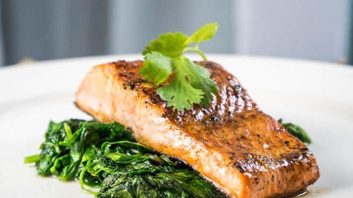 Grilled Salmon · Italian Herb marinated “Faroe Island” Salmon, grilled to perfection.