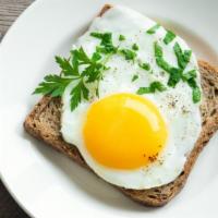 2 Sunny Side Up Eggs · Delicious eggs fried with the yolk up.