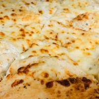 Loaded Garlic Cheese · Roasted garlic, lots of mozzarella, ricotta, Romano, and Parmesan cheese.