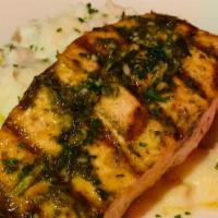 Herb Grilled Salmon · Charbroiled Atlantic salmon filet brushed with fresh herb vinaigrette. Served with choice of...
