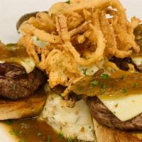 French Onion Filet · Medallions of beef tenderloin served over garlic croutons then finished with French onion br...