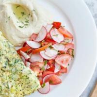 Herb And Feta Omelet Plate · Omelet with parsley, scallion, basil and cilantro, hummus, tomato, radish salad, and pita br...