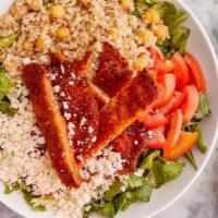 Chicken Schnitzel Salad · Mix Lettuce and Arugula, Quinoa, Chickpeas, Tomato, Feta Cheese, Lemon Olive Oil, Basil Dres...