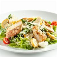 Chicken Caesar Salad · Grilled chicken served over lettuce, tomato, onions, shaved Parmesan cheese, and Caesar dres...