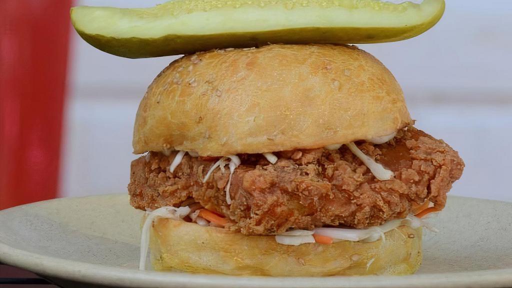 The Colonel · Fried Chick'n, White Cabbage, Crunchy Dill Pickle, Herb Aioli.