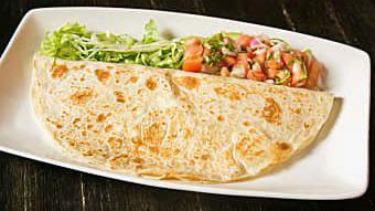 Quesadilla · Grilled flour tortilla filled with Monterrey Jack Cheese, served with pico de gallo & lettuc...