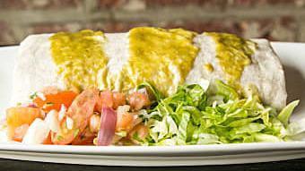 Acapulco Burrito · Monterey Jack cheese, guacamole, sour cream, rice, beans & topped with green sauce(tomatillo...