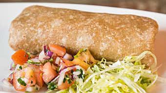 Vegetable Burrito · Whole wheat tortilla filled with grilled vegetables, beans, and brown rice. Served with pico...