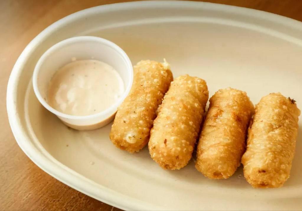 Tequenos · 4 cheese filled breadsticks.