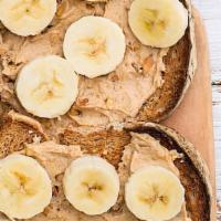 Pb Banana Toast · Peanut butter, gluten-free bread, banana on top, cinnamon.