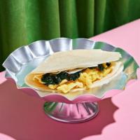 Spinach Egg Florentine Crepe · Scrambled egg with spinach, garlic, and Parmesan cheese wrapped in a warm crepe.
