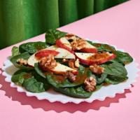 Spinach Salad · Spinach topped with apples, walnuts, fresh Parmesan, and a balsamic vinaigrette.