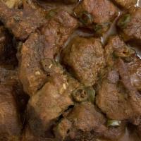 Beef Rendang · Hot and spicy. Tender beef braised in a thick spicy curry sauce with coconut milk and lime l...