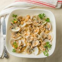 Linguini White Clam Sauce · Whole baby clams mixed with chopped sea clams served in a white wine, and garlic sauce.