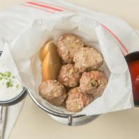 Mini Meatballs · Served with tomato dipping sauce and ricotta cheese.