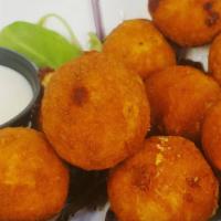 Buffalo Bites · Chunks of buffalo chicken rolled in five kinds of cheese deep fried. Served with ranch.