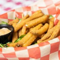 Fried Pickles · Served with chipotle ranch.