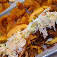 Pulled Pork Sammie · Bbq pulled pork and coleslaw on two potato rolls.