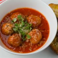 Polpettine · veal meatballs, tomato sauce, robiolina cheese, basil, toasted pane di. sesamo