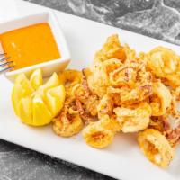Los Calamares · Fried light and crisp. Served with chipotle-mayo sauce and salsa roja.
