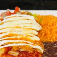 Chimichanga · Crispy fried burrito filled with beans, cheese and your choice of meat:  Chicken-Tinga, Carn...