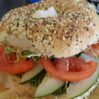 Sprout Bagel · Vegetarian. Toasted everything bagel with avocado, Cream cheese, clover sprouts, tomato, and...