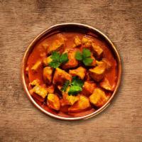 Chicken Tikka Masala · Cubes of tender chicken cooked with onions and bell peppers in tomato and onion sauce served...
