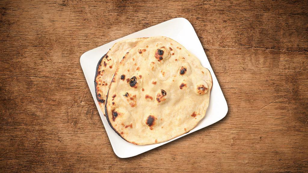 Roti · House made pulled and leavened dough baked to perfection in an Indian clay oven