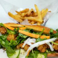Shrimp Bahn Mi · Mayonnaise, jalapeno, marinated fried shrimp, fresh cucumbers, daikon and pickled carrots wi...
