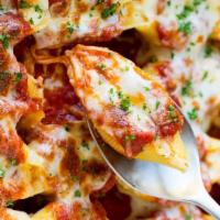 Stuffed Shells · Classic ricotta stuffed shells with flavorful three-cheese ricotta filling and delicious mar...