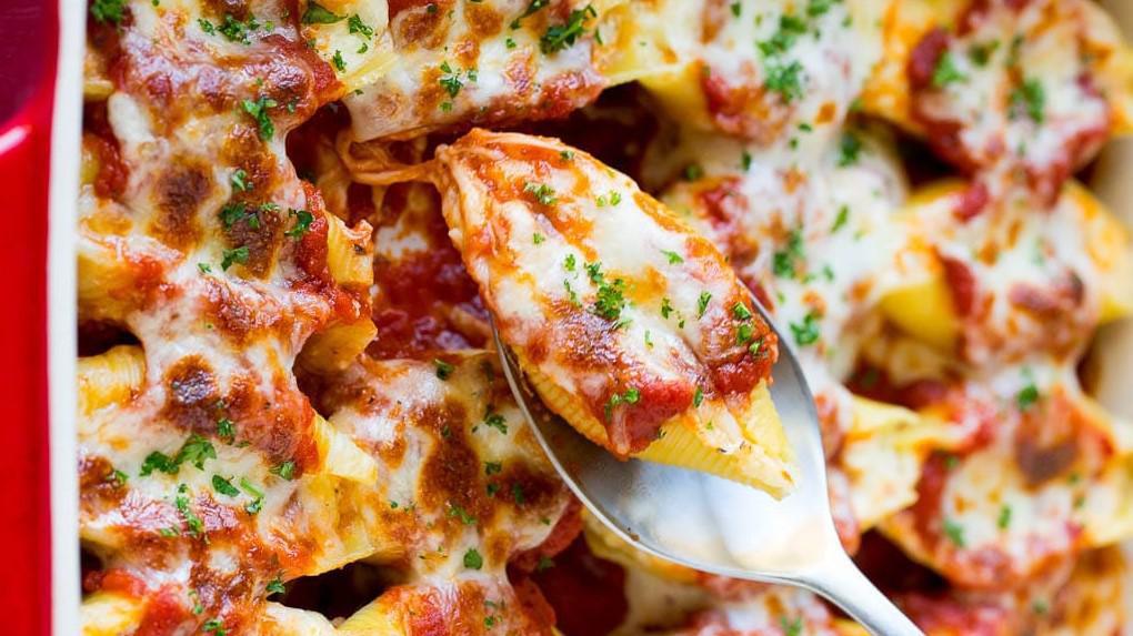 Stuffed Shells · Classic ricotta stuffed shells with flavorful three-cheese ricotta filling and delicious marinara sauce.
