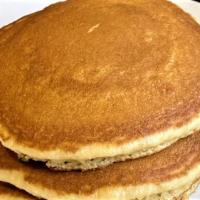 Banana Pancakes · Served with butter and syrup.