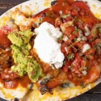 Nachos Deluxe · Tortilla chips, beans, cheese, chorizo, sour cream, guacamole and ranchero sauce. Includes y...