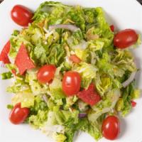 Tex Mex Salad · Fresh chopped romaine lettuce, tortilla strips, rajas, corn, beans, tomatoes, red onions, Mo...