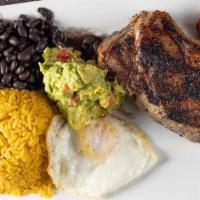 Bandeja Azteca · New York steak, fried egg, sweet plantains, sour cream and guacamole.