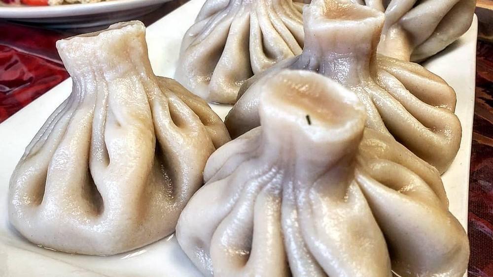 Khinkali · hand-rolled dumplings filled with seasoned ground meat