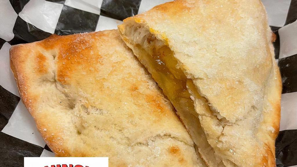 Calzones · Mozzarella & ricotta  extra topping for an additional price