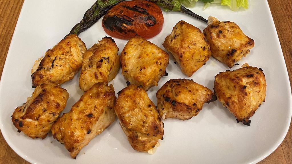Chicken Shish Kebab · Tender chunks of chicken marinated with chefs' own blend of herbs & spices.