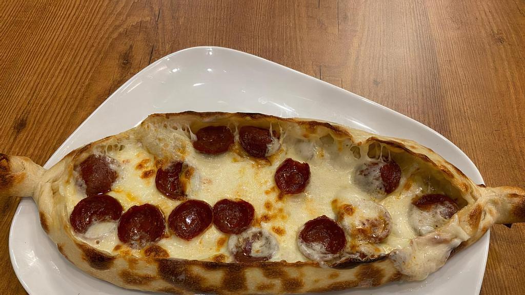 Sausage & Cheese Pide / Sucuklu Kasarli Pide · A thin crust topped with turkish sucuk (sausage) and mozzarella cheese.