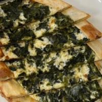 Spinach Pide / Ispanakli Pide · Thin crust topped with spinach and mozzarella cheese.