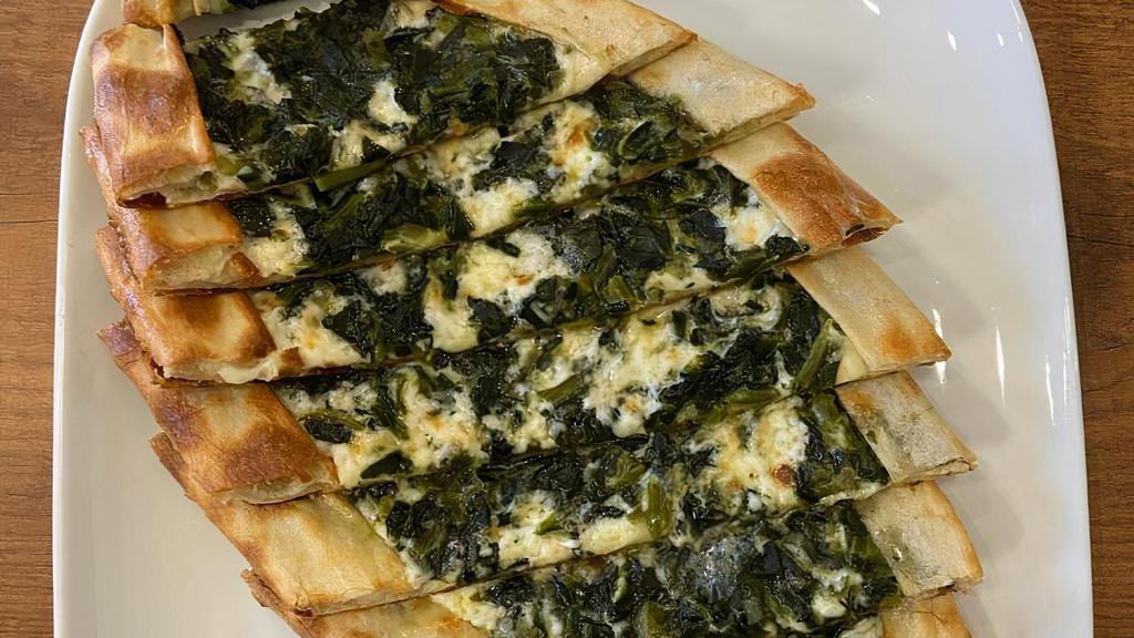 Spinach Pide / Ispanakli Pide · Thin crust topped with spinach and mozzarella cheese.