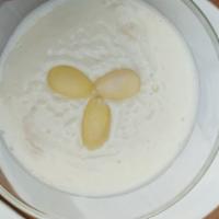 Keskul · (Almond Pudding) whole milk, sugar, almond extract, shredded almond, and corn starch.