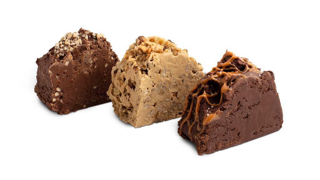 Fudge Flavors · Rich, smooth and creamy, our fudge is made the old fashioned way: with fresh, wholesome ingredients, cooked in copper kettles, then formed by hand into a huge 