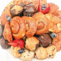 Breakfast Platter · An elegant assortment of our freshly baked mini muffin, scone, danishes, bagel and croissant...