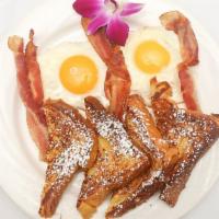 Challah French Toast Or Pancakes · With powdered sugar, seasonal berries, sausage, bacon or turkey.