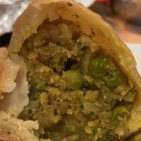 Keema Samosa · Crisp patties stuffed with ground chicken & pea with a little spices.
