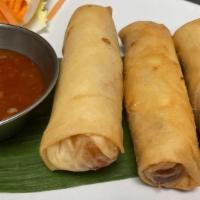 Crispy Spring Roll · Vegetarian. Deep-fried rolls stuffed with vermicelli and vegetables served with sweet chili ...