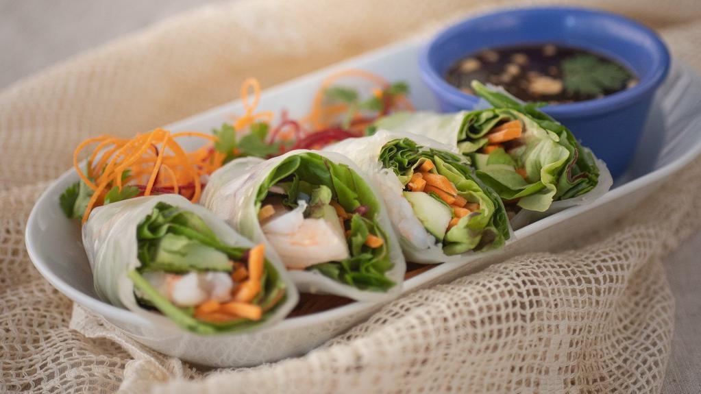 Thai Chic Roll · Shrimp, lettuce, carrots, mint, and cucumber wrapped in fresh vermicelli skin with hoisin-peanut sauce.
