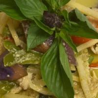Green Curry · Spicy. Green chili paste with eggplants, fresh basil, bamboo shoots, bell peppers, string be...