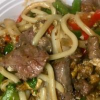 Udon Drunken Noodle · Spicy. Stir-fried udon in spicy sauce with onions, fresh chili, bell peppers, fresh basil an...